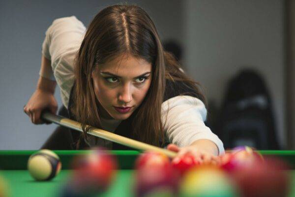 lady playing snooker